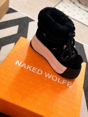 Naked Wolfe Black Faux Fur Platform Ankle Boots with White Sole